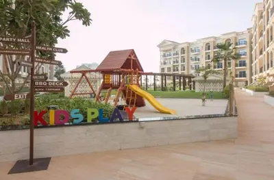a playground in a city with a slide at FIRST CLASS Studio Elegant Escape, Cozy Luxe in Dubai