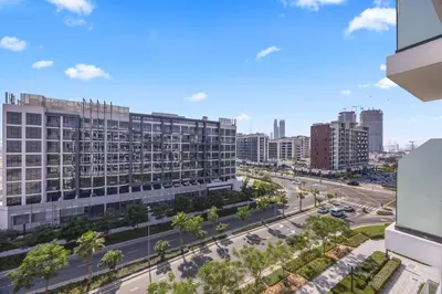 an aerial view of a city street with buildings at Elite Escapes - Boy Girl Apartment Edition in Dubai