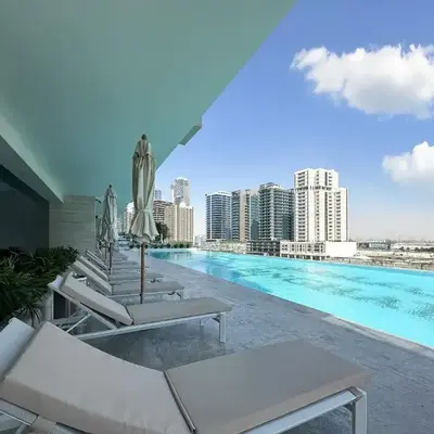 Peaceful Studio Stay Canal Views Poolside Comfort