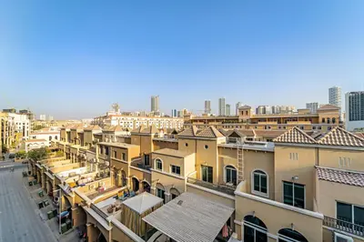 a group of buildings in a city with tall buildings at FIRST CLASS Studio Luxe & Cozy Vibes in Dubai