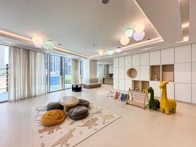 a large living room with animals on the floor at Grande Signature Burj Khalifa view 4 Min walk Dubai Mall Infinity Pool with Fountain View Free parking By The Meridian in Dubai