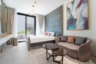 a hotel room with a bed and a couch at Contemporary Studio Terrace Luxe & Secure Stay in Dubai