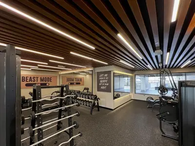 a fitness room with a bunch of equipment at Modern Studio Downtown Dubai Luxury & Convenience in Dubai