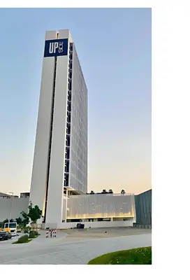 a tall building with a sign on the side of it at Modern Studio at Upside Living, Business Bay with Burj Khalifa View in Dubai