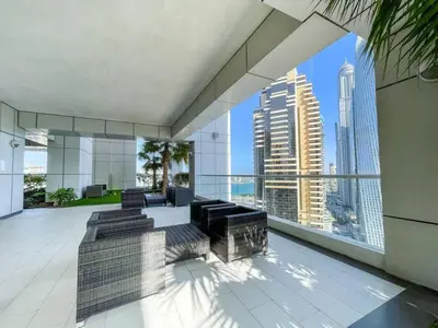 a living room with a view of the city at SUNRISE HOMES - Charming 1-BR Just a walk to JBR Beach in Dubai