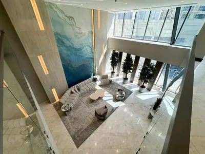 an overhead view of a lobby in a building at High-Floor Marina View - Balcony, Pool and Gym in Dubai