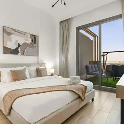 Bright 2BR Retreat Balcony & Pool Near Jumeirah Village Circle