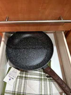 a black hat sitting on top of a table at Livincci - Luxury Studio in Dubai Marina - 16 in Dubai