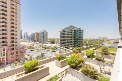 an aerial view of a city street with buildings at Near Dubai International Cricket Stadium, Minutes drive to Mall of the Emirates, The Matrix Tower, Sports City By Deluxe Holiday Homes in Dubai