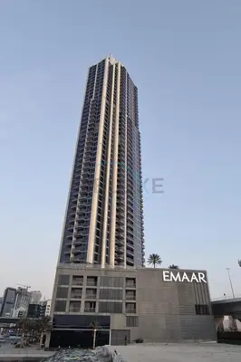 a tall building with a sign on the side of it at Short walk to Marina Walk and JBR Beach, close to Bluewaters Island and Ain Dubai, 5242 Tower 1, Dubai Marina by Deluxe Holiday Homes in Dubai