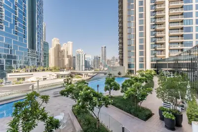 a view of a city skyline with tall buildings at Short walk to Marina Walk and JBR Beach, close to Bluewaters Island and Ain Dubai, 5242 Tower 1, Dubai Marina by Deluxe Holiday Homes in Dubai