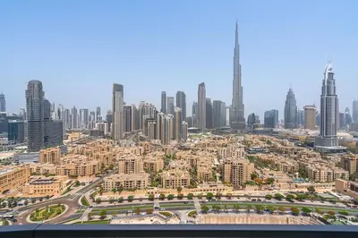 an aerial view of a city with tall buildings at Stylish 2BR - Near Burj Khalifa & City Views in Dubai