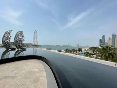 a view of the ocean from the roof of a building at Address Beach Resort - 1BDR With Private Beach in Dubai