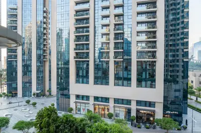 an aerial view of a tall building in a city at Luxury 1BR Suite I Boulevard View I Downtown Dubai in Dubai