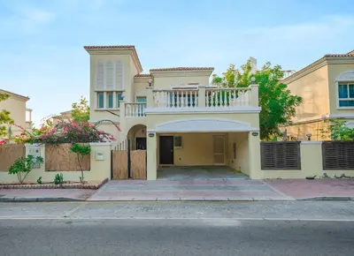 a large white house with a balcony at Dubai Villa - Beautifully Appointed in Dubai