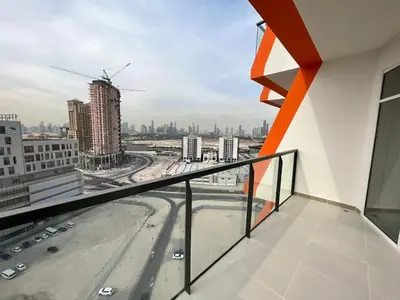a balcony of a building with a view of a city at Binghatti Gateway 2BHK At Jaddaf By al Sarya Holiday Home in Dubai