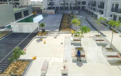 an overhead view of a courtyard of a building at Appartement moderne et élégant in Dubai