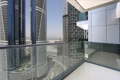 a view from the balcony of a skyscraper at Centrally Located 1BR in Business Bay Near Canal and Downtown in Dubai