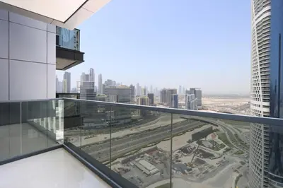 a view of the city from the top of a building at Centrally Located 1BR in Business Bay Near Canal and Downtown in Dubai