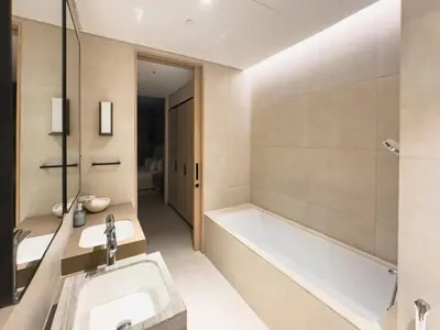 a bathroom with a bath tub and a sink at ADDRESS BEACH RESORT Residence Million Dollar Sea and Palm View DXB AIRPORT VIP Shuttle option in Dubai