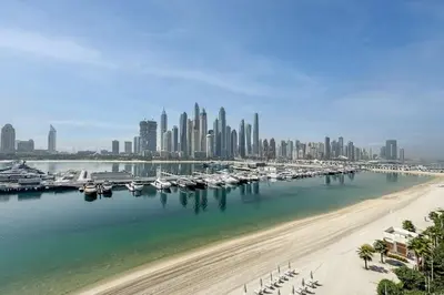 a view of a harbor with boats in the water at Brand New Stylish 1-Bed Getaway with Private Beach and Palm Views in Dubai