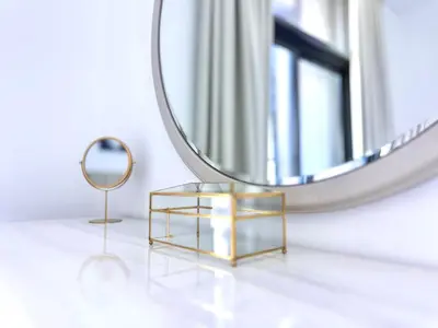 a mirror and a glass table in front of a mirror at Luxury Apartment Burj Khalifa View Summer Offer in Dubai