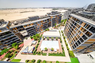 an aerial view of a city with buildings at Studio in Dubai Production City in Dubai