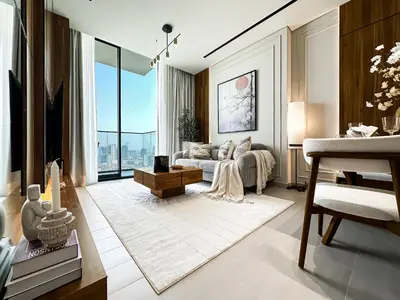 a living room with a couch and a large window at Feel at Home Stylish 1BR in Binghatti Tulip Dubai in Dubai