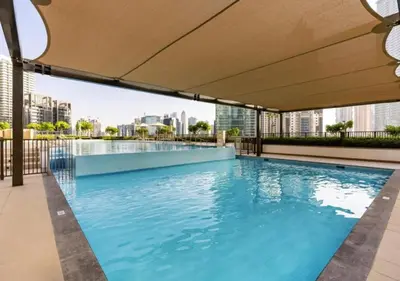 a swimming pool on the roof of a building at Luxurious and Spacious 2BR Burj Crown Downtown in Dubai