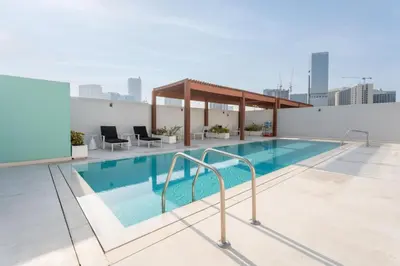 a swimming pool on the roof of a building at GuestReady - Rooftop Pool l Garden l Nice Balcony in Dubai