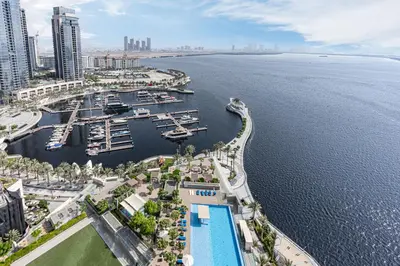an aerial view of a marina with boats in the water at Stunning Home with Creek and Downtown Views in Dubai