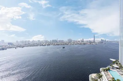 a view of a large body of water with a city at Stunning Home with Creek and Downtown Views in Dubai