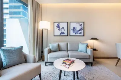 a living room with a couch and a table at Address Opera - Ultra luxurious 2BDR in Downtown in Dubai