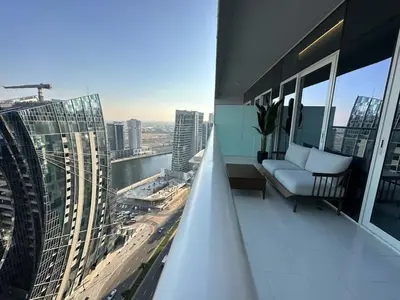 a balcony of a building with a view of a city at Brand new 1BDR in Vera- Business Bay in Dubai