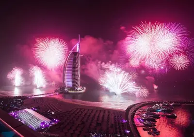 a view of the burj khalifa with fireworks at night at Rahaal 1 BDR, Madinat Jumeirah in Dubai