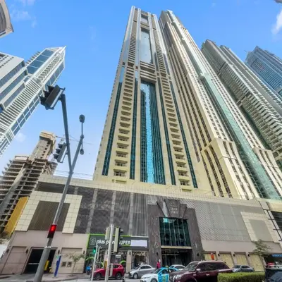 a tall building with cars parked in front of it at 1BR in Sulafa Tower- Ideal for Short-Term Stay in Dubai