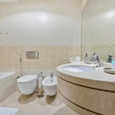 a bathroom with a toilet and a sink at 1BR in Sulafa Tower- Ideal for Short-Term Stay in Dubai