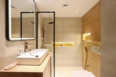a bathroom with a sink and a shower at Stylish Studio with Spacious Balcony Walk to JBR Beach in Dubai
