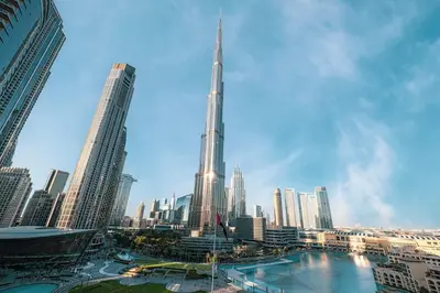 a view of a city with a tall building at Panoramic Burj & Fountain Views 2BR in Dubai
