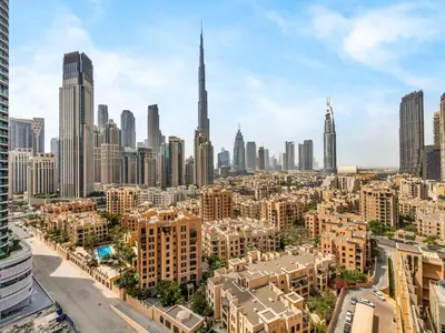 an aerial view of a city with buildings at Burj Khalifa View 2 Bedroom Apartment in Dubai