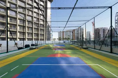 a tennis court in the middle of a city at Luxury Retreat in Arjan with Refined Living in Dubai