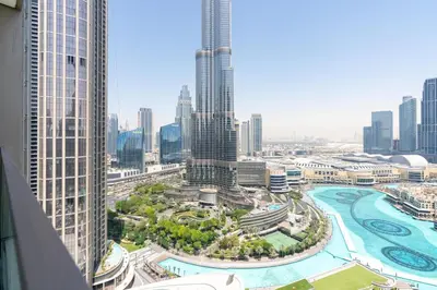 an aerial view of a city with tall buildings at Grande, Luxurious 2 BR, Burj Khalifa & Fountain view in Dubai