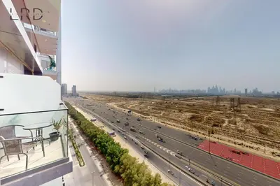 a view of a highway from a building at Chic and Aesthetic Studio! Move-In Ready in Dubai
