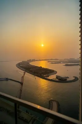 an aerial view of a harbor at sunset at Best Emaar Beachfront view one bedroom in Dubai