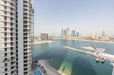 a view of a river from a tall building at 1BR With Private Beach Access, Near Dubai Marina Walk, Next to Dubai Harbour Marina & Yacht Club, Palace Beach Residence, Dubai Marina by Deluxe Holiday Homes in Dubai