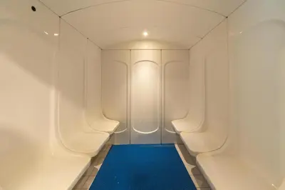 a hallway with a blue floor and a bath tub at Ahlan HH - Stylish Suite Heart of Business Bay Avanti Tower in Dubai