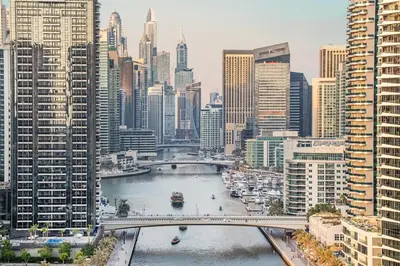 a view of a river in a city with buildings at Lux 3BHK in Dubai Marina w Marina View DEC 1407 in Dubai