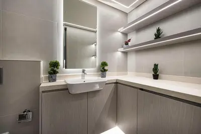 a bathroom with a sink and a mirror at Luxury 1 BHK in Jumeirah Village Circle BydPie Concept 302 in Dubai