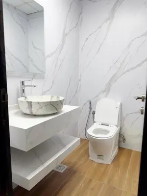 a bathroom with a sink and a toilet at Luxury 3BHK in Dubai Marina DEC 1603 in Dubai
