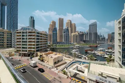 a view of a city with a river and buildings at Luxury 3BHK in Dubai Marine By dPie DEC 903 in Dubai